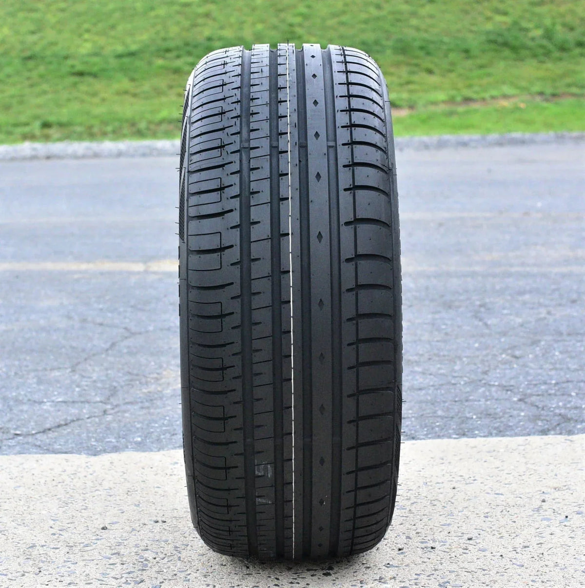 A pair of 2(2) 225/40R20 101W XL AS A/S performance tires